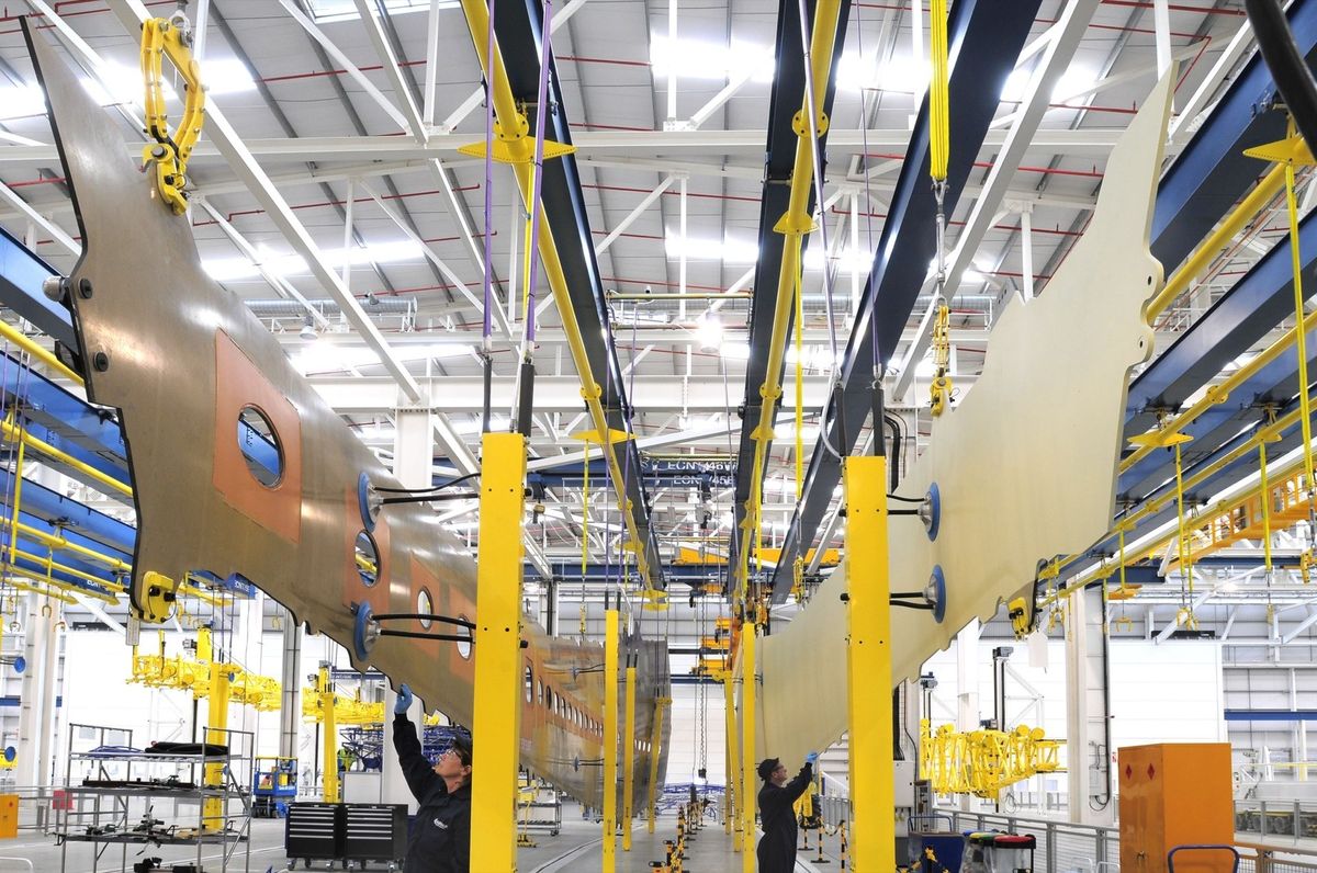 Aircraft wing panels on the assembly line in a manufacturing facility