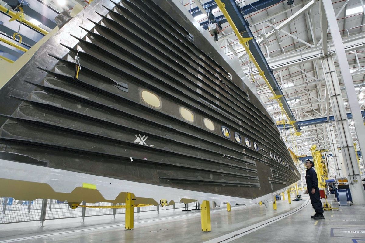 Aircraft wing spar structure in an aerospace manufacturing facility